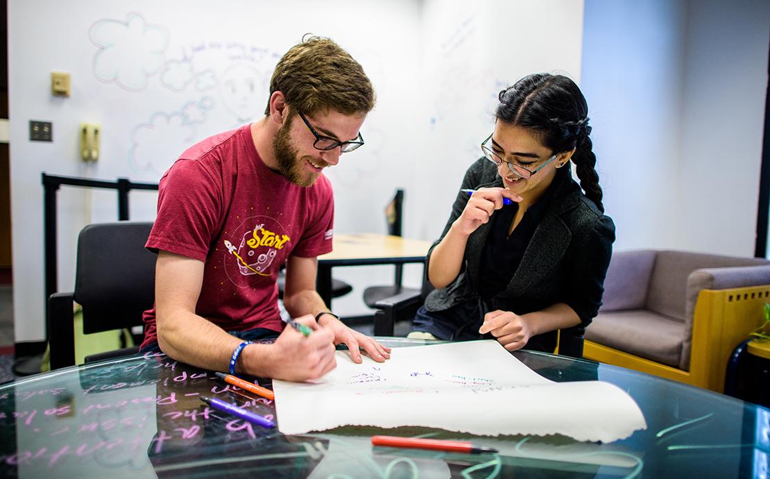 two students working on project