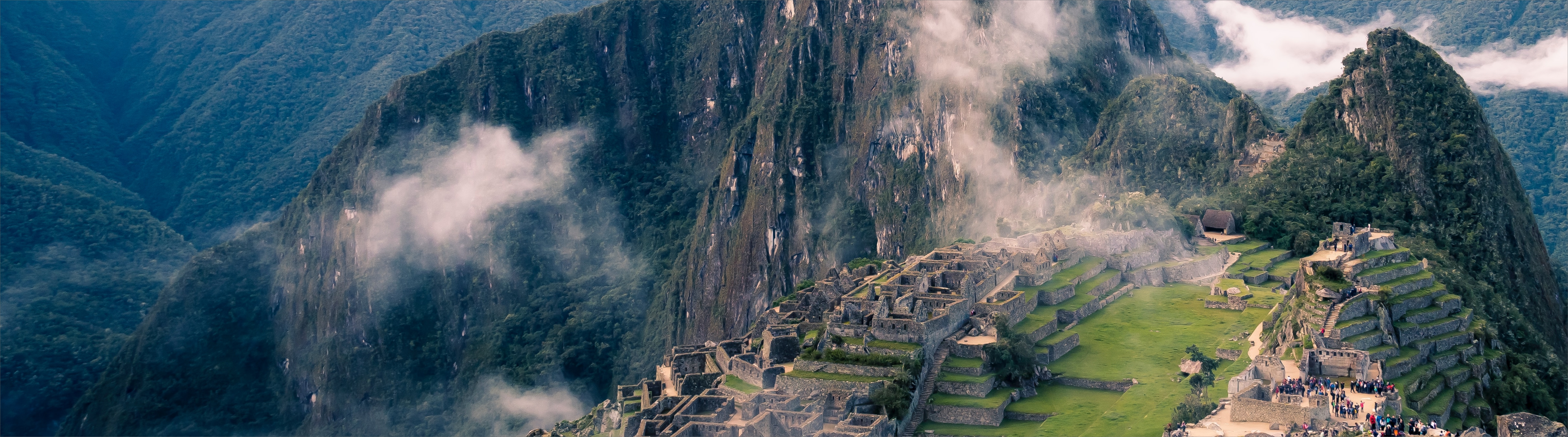 Misty mountain with an ancient city on top