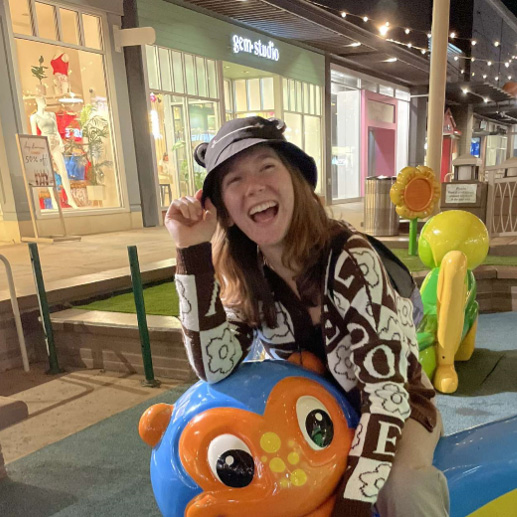 Lila Rose, a young woman wearing a bucket hat and smiling.